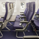 Illustration for article titled New Budget Airline Seats Swap Screens For Built-in Tablet Holders
